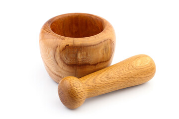 Wooden mortar and pestle isolated.