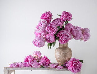 Beautiful bouquet of pink peonies in vase