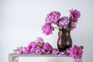 Beautiful bouquet of pink peonies in vase