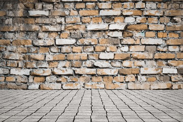 Empty room with bricks wall and tiled floor.