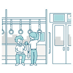 電車内で会話する男子生徒たちの通学風景