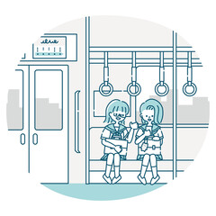 電車の中で会話する女子生徒たちの通学風景