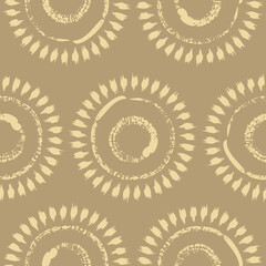 Vector drawn yellow suns ocher seamless pattern