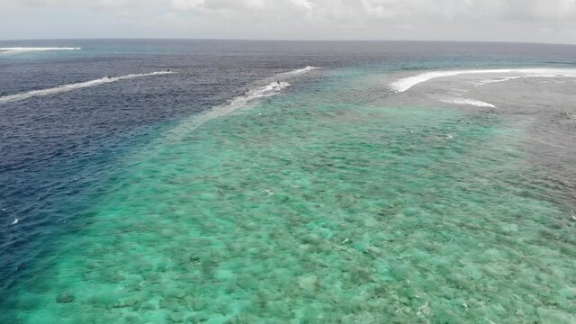 Aerial view of a hydrocycle in a deep blue colored sea