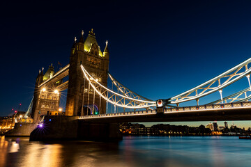 Fototapeta na wymiar tower bridge with lights on at night