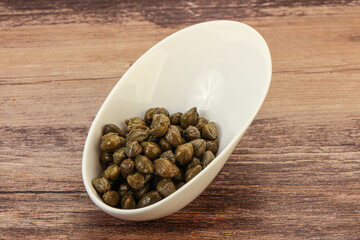 Tasty capers in the bowl