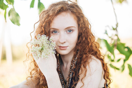 Red hair woman in the summer locations