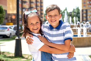 Beautiful children smile and look into the frame. Summer. heat. holidays