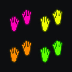Obraz premium Animal Footprints four color glowing neon vector icon