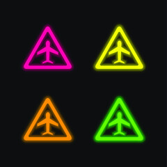 Airport Traffic Triangular Signal Of An Airplane four color glowing neon vector icon