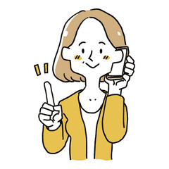 携帯電話で話をしている女性