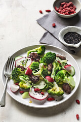 Broccoli  Radish and Morning Glory Sprout Salad with caramelised Garlic Balsamic  and Goji Berry