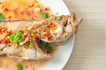 Steamed grouper fish with lime and chillies