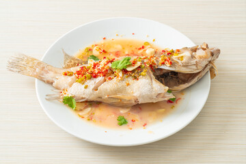 Steamed grouper fish with lime and chillies