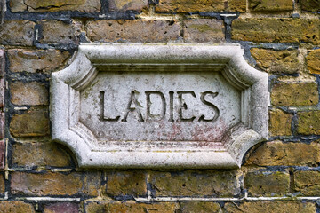 A Victorian Gentlemen sign for the bathroom cast in concrete