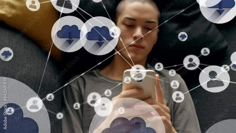 Poster clouds icons and network of profile icons against caucasian man using smartphone at home