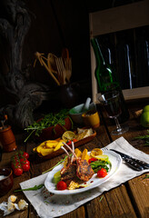 Lamb chops marinated in herbs with green asparagus and lime