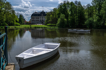 Boat in the pond in Palace Garden in Pszczyna Castle, Zamek w Pszczynie, Poland
