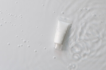 cosmetic bottle cream packaging product on white water background