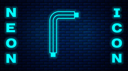 Glowing neon Tool allen keys icon isolated on brick wall background. Vector