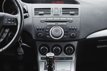 Obraz na płótnie Canvas Details of air conditioning (car ventilation system) in modern car