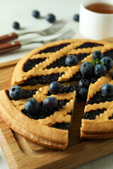 Concept of delicious breakfast with blueberry pie