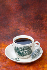 cup of coffee with beans-Traditional Kopi O commonly served in Malaysia and Singapore.
