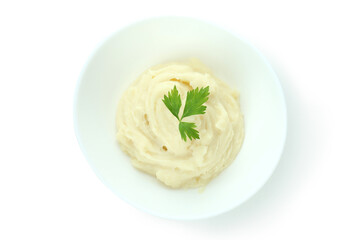 Plate of mashed potatoes isolated on white background