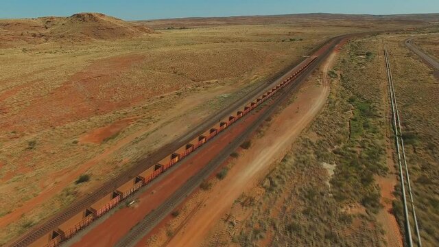 Indian Pacific Railway. Aerial view of a freight train traveling through the Australian steppe.