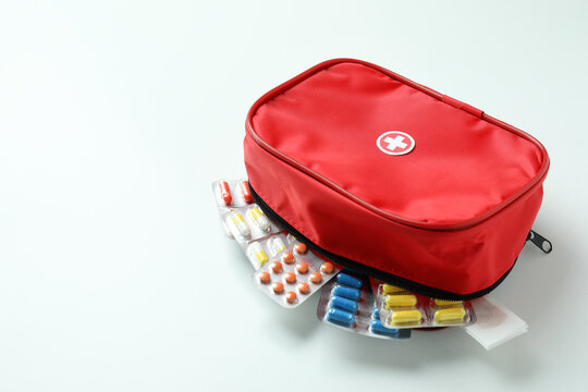 First aid medical kit on white background