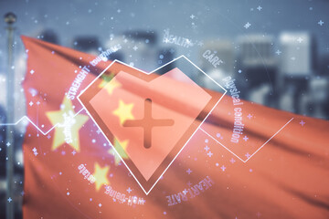 Abstract virtual concept of heart pulse illustration on flag of China and blurry skyscrapers background. Medicine and healthcare concept. Multiexposure