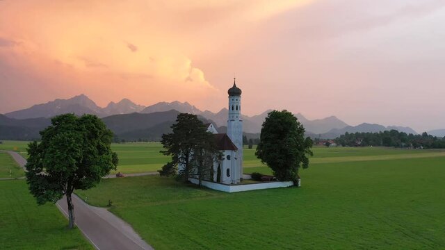 Schwangau, Germany. Aerial view of Curch St. Coloman, Bavaria at sunset.