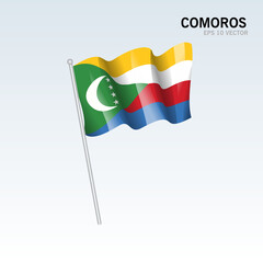 Comoros waving flag isolated on gray background
