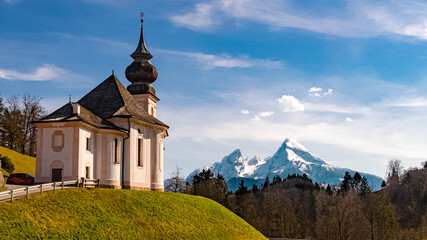 Beautiful spring view of the church Maria Gern with the famous Watzmann summit in the background on a sunny day near Berchtesgaden, Bavaria, Germany