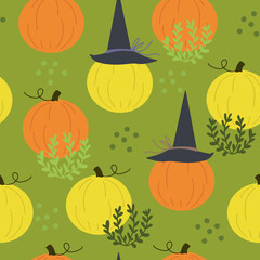 Seamless pattern with cute Halloween pumpkins in witches hats on a field like background