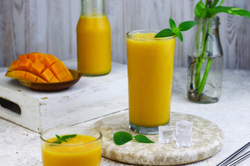 Mango Juice or jus mangga on white background. Fresh healthy during during summer holiday. 