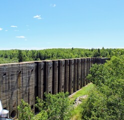 Panoramic view of the former hydroelectric power station. Pinawa Dam. River, forest, sky in the background. 