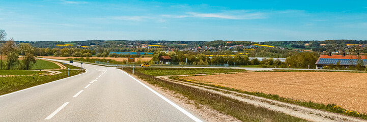 Beautiful spring view with yellow rapeseed fields near Reisbach, Bavaria, Germany