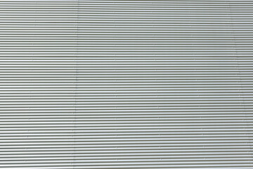 Surface of corrugated metallic texture.Industrial wall.