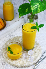 Mango Juice or jus mangga on white background. Fresh healthy during during summer holiday. 