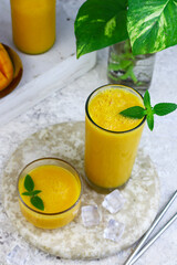 Mango Juice or jus mangga on white background. Fresh healthy during during summer holiday. 