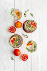 Summer cocktails with blood orange grapefruit and ice. Top view