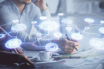 Double exposure of man and woman working together and social network theme hologram drawing. People connection concept. Computer background.