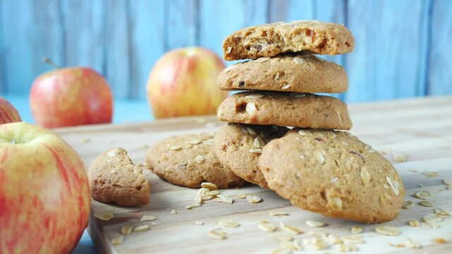 Crunchy sweet apple oat cookies on table 