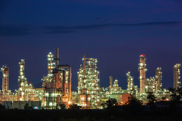 Obraz na płótnie Canvas Night scene of oil refinery plant and power plant of Petrochemistry industry