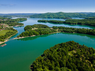 Fototapeta na wymiar Summer at Solina Lake in Bieszczady Mountains Park, Poland. Aerial Drone View. Summer Day, Turquoise Water.