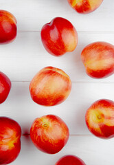 top view of fresh ripe nectarines isolated on white background