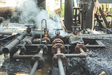 Corrosion rusty through valve tube steam gas leak pipeline - obrazy, fototapety, plakaty
