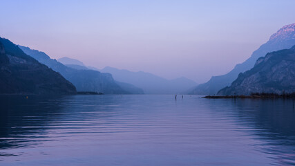 Obraz premium Silhouettes of the Alps mountains at sunset. Lake Uri. Switzerland.