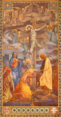 VIENNA, AUSTIRA - JUNI 24, 2021: The fresco Crucifixion in the Votivkirche church by brothers Carl...